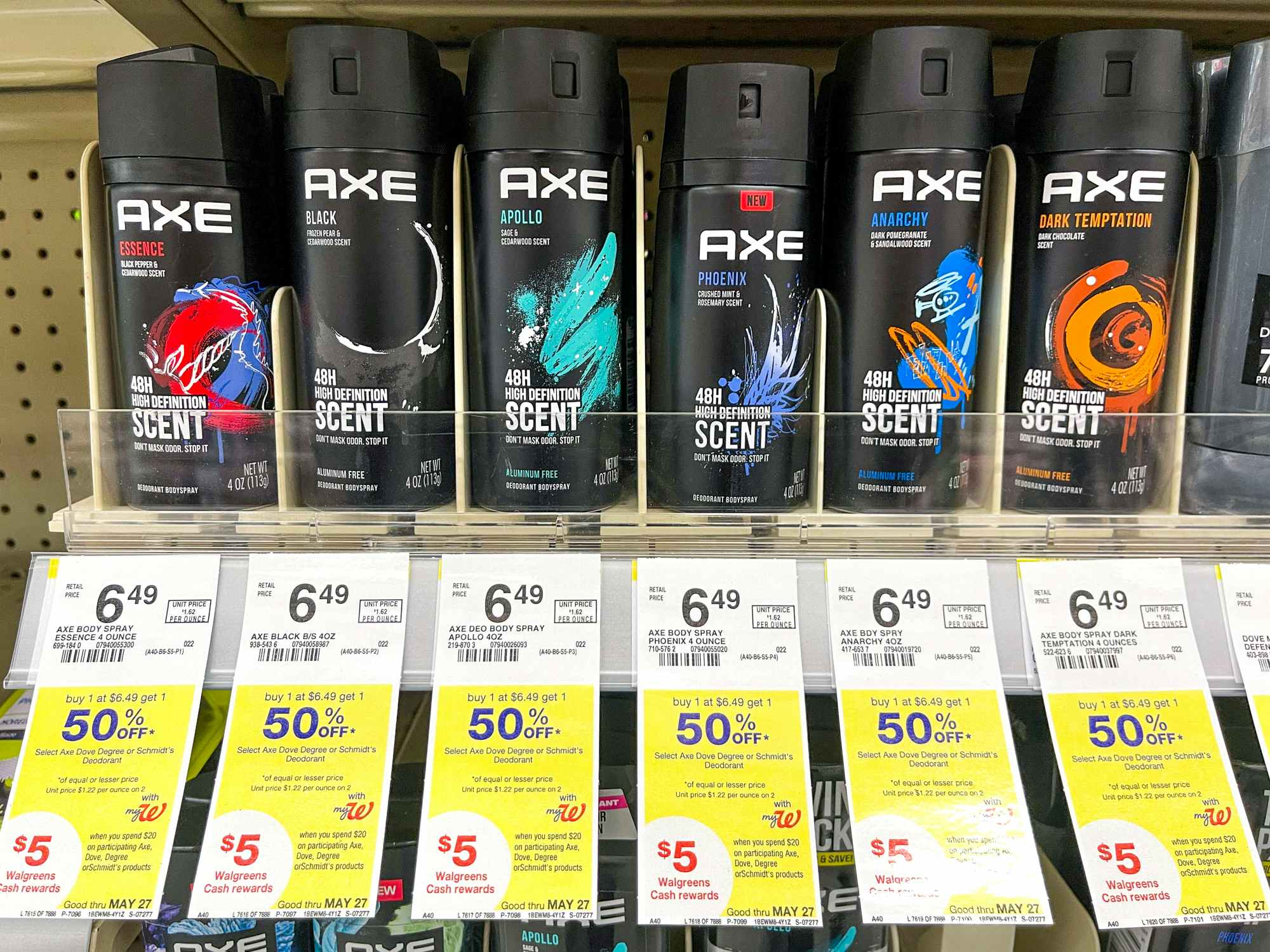 Axe Body sprays stocked at Walgreens with sale tags for Buy One Get One 50% off