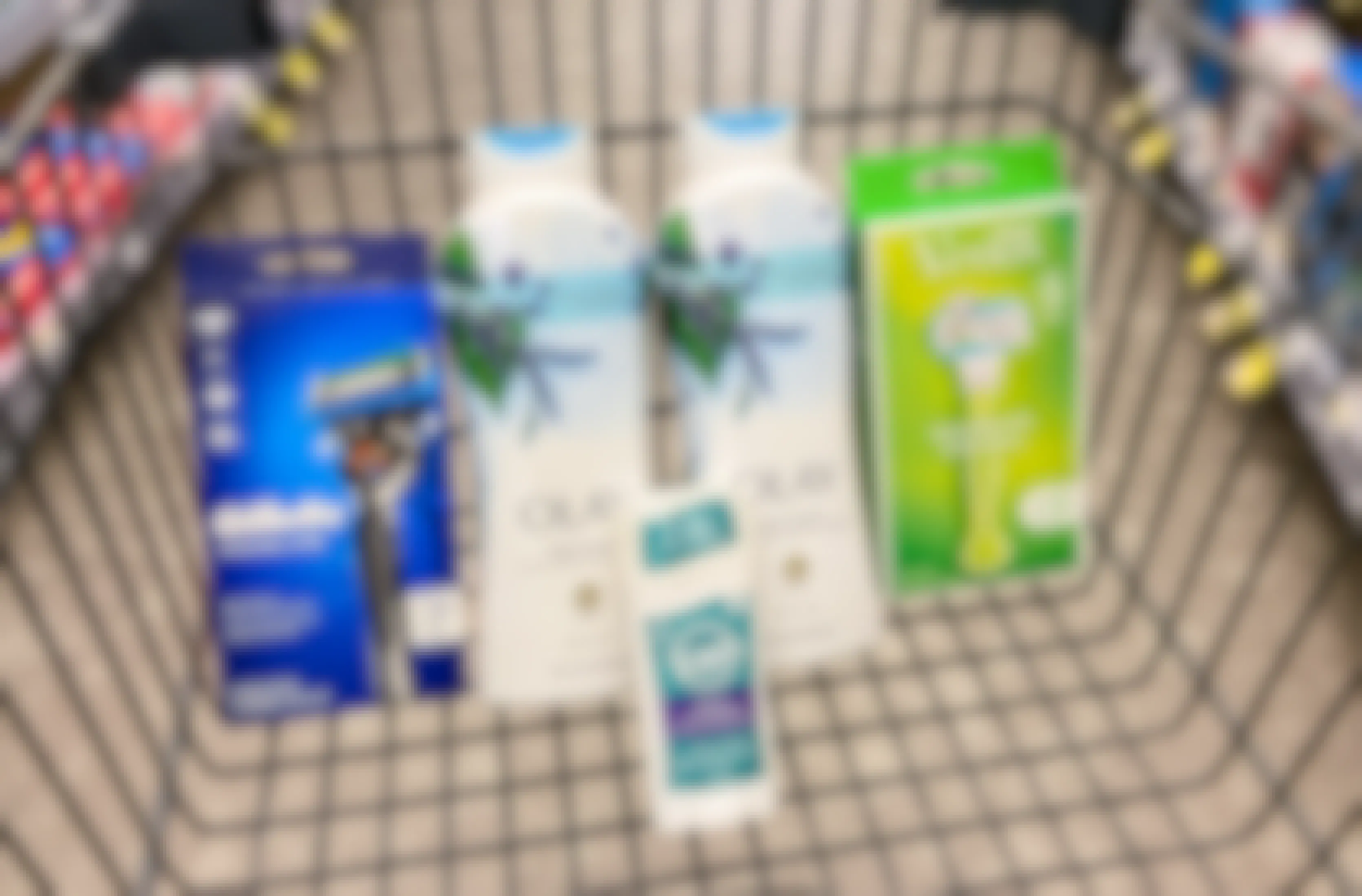 a walgreens cart with olay body wash, gillette and venus razors, and tom's deodorant