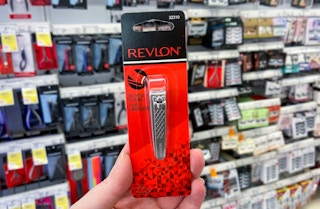 hand holding revlon nail clipper at walgreens