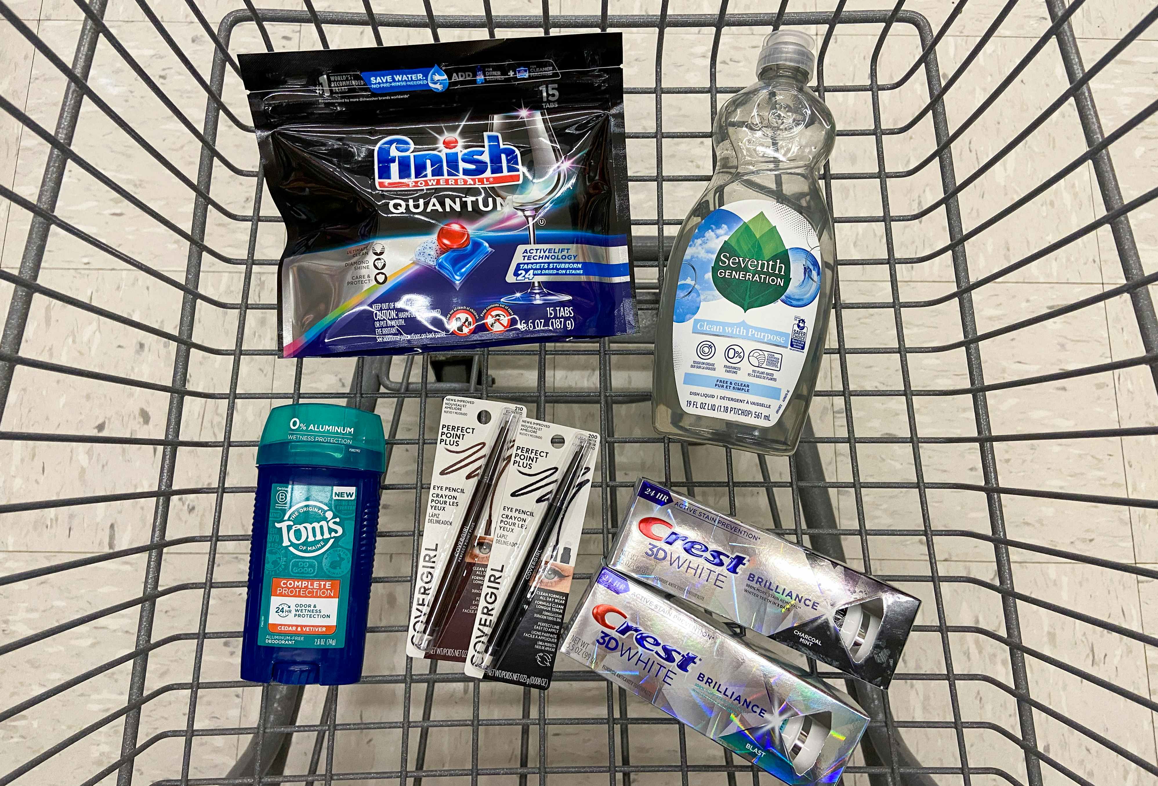 a walgreens shopping cart with Tom's of Maine deodorant, crest toothpaste, seventh generation dishwashing liquid, finish dishwashing tabs, and covergirl eyeliner