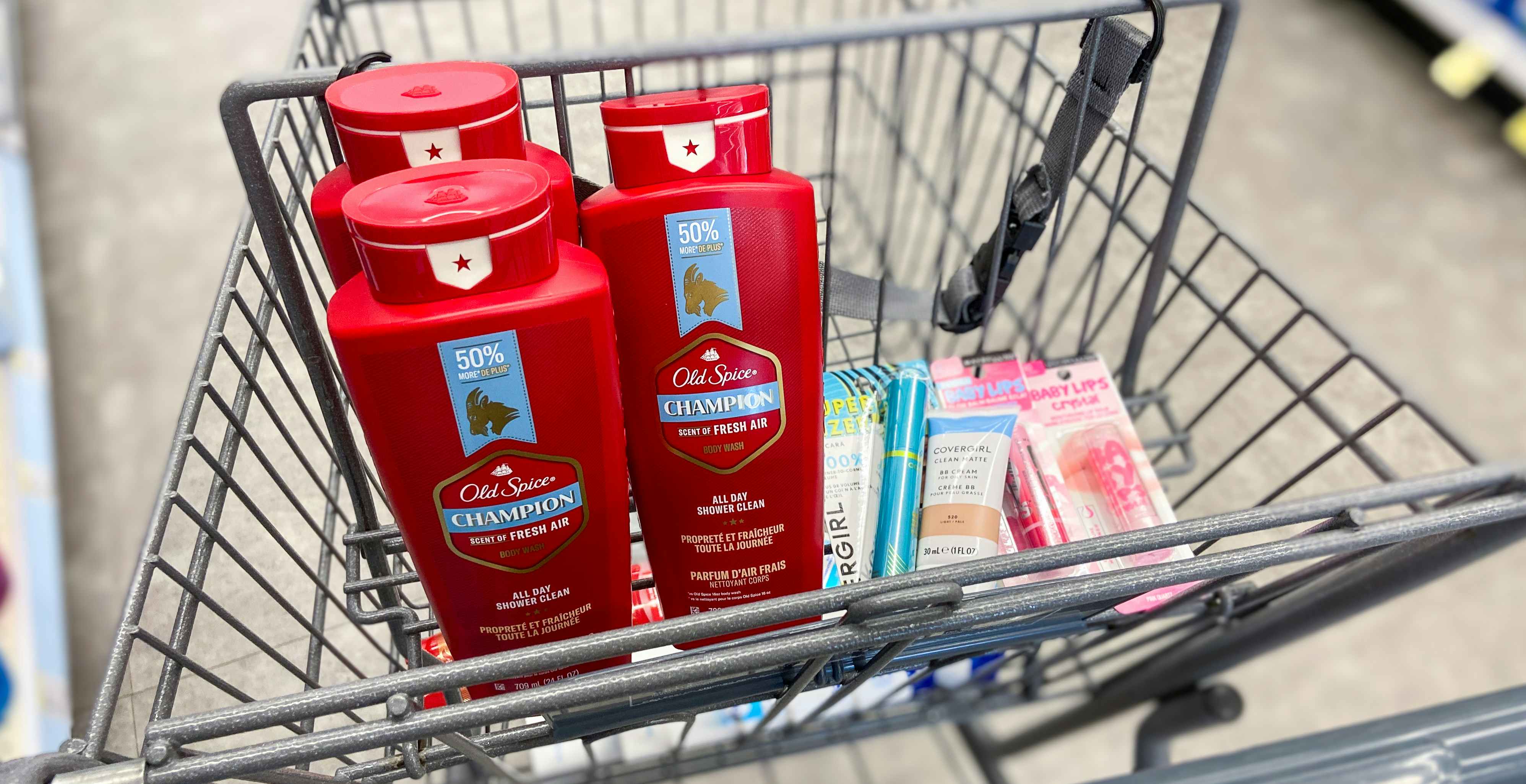 a walgreens shopping cart with old spice body wash, covergirl makeup, and maybelline makeup
