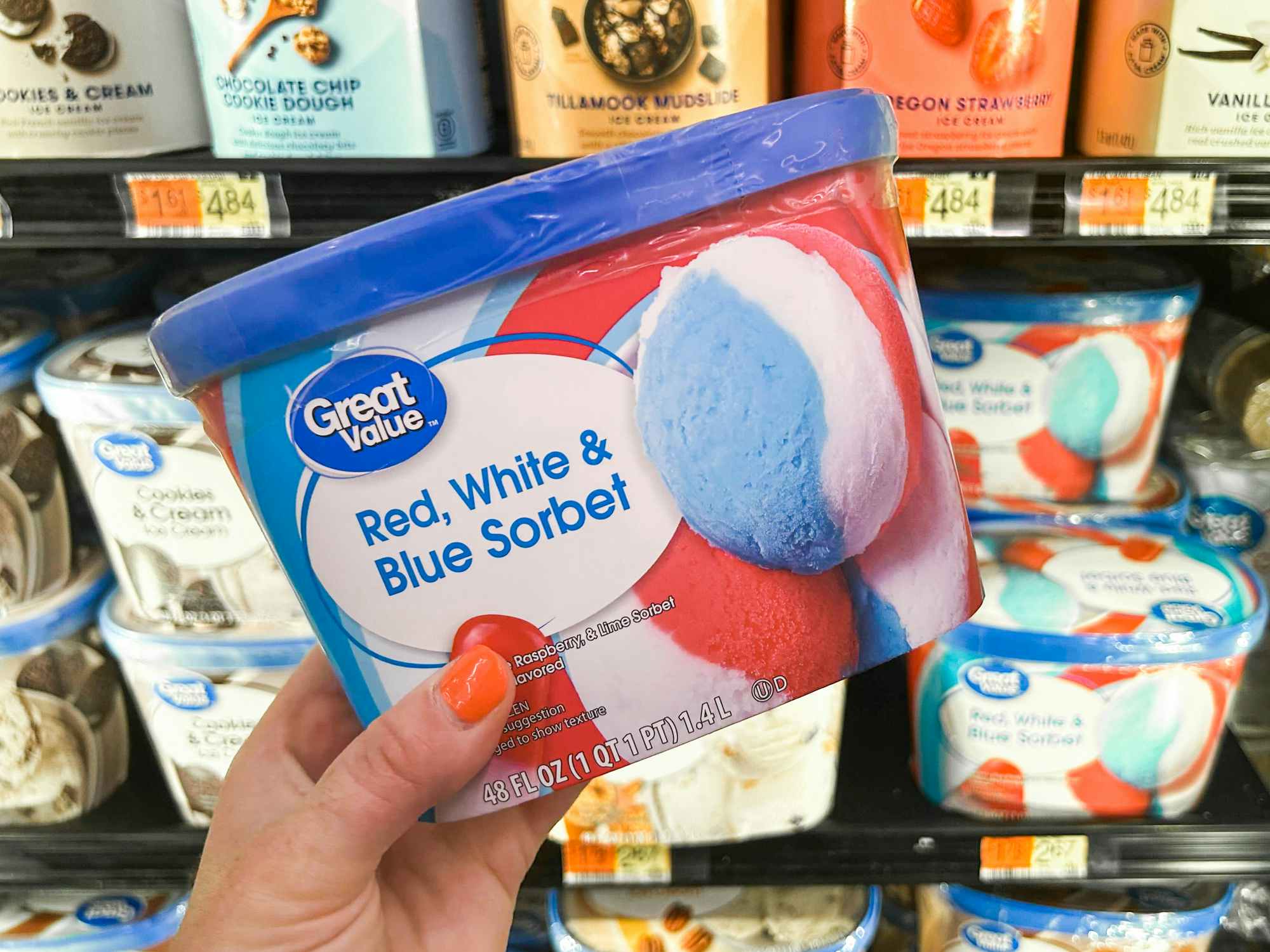Someone holding some Red White and Blue ice cream in Walmart