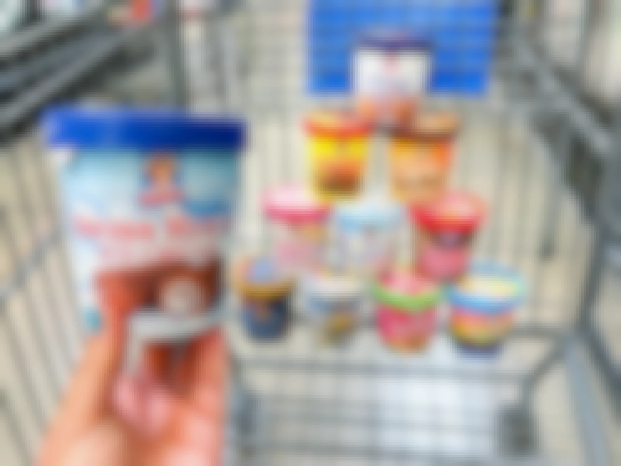Some Little Debbie dessert flavored ice cream pints in a Walmart cart