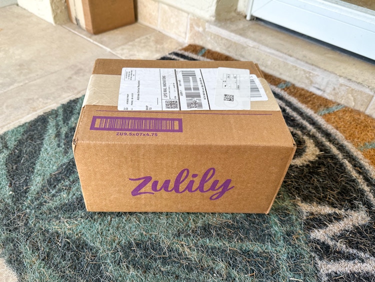 A Zulily box on a porch