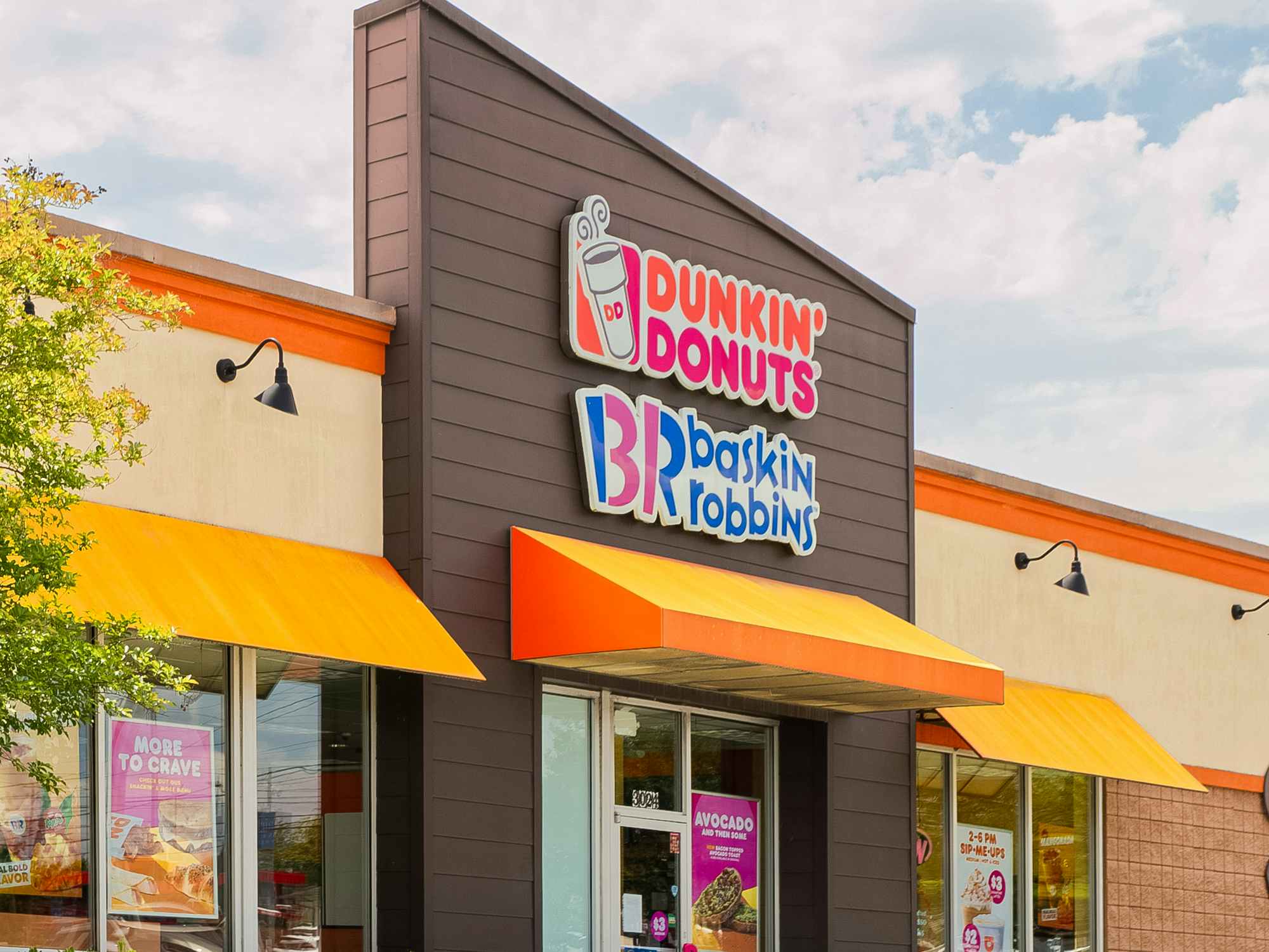 The exterior of a Baskin Robbins and Dunkin Donuts combination restaurant