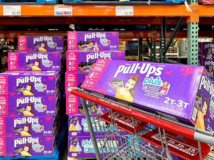 box of huggies pull-ups plus in princess designs in a costco shopping cart