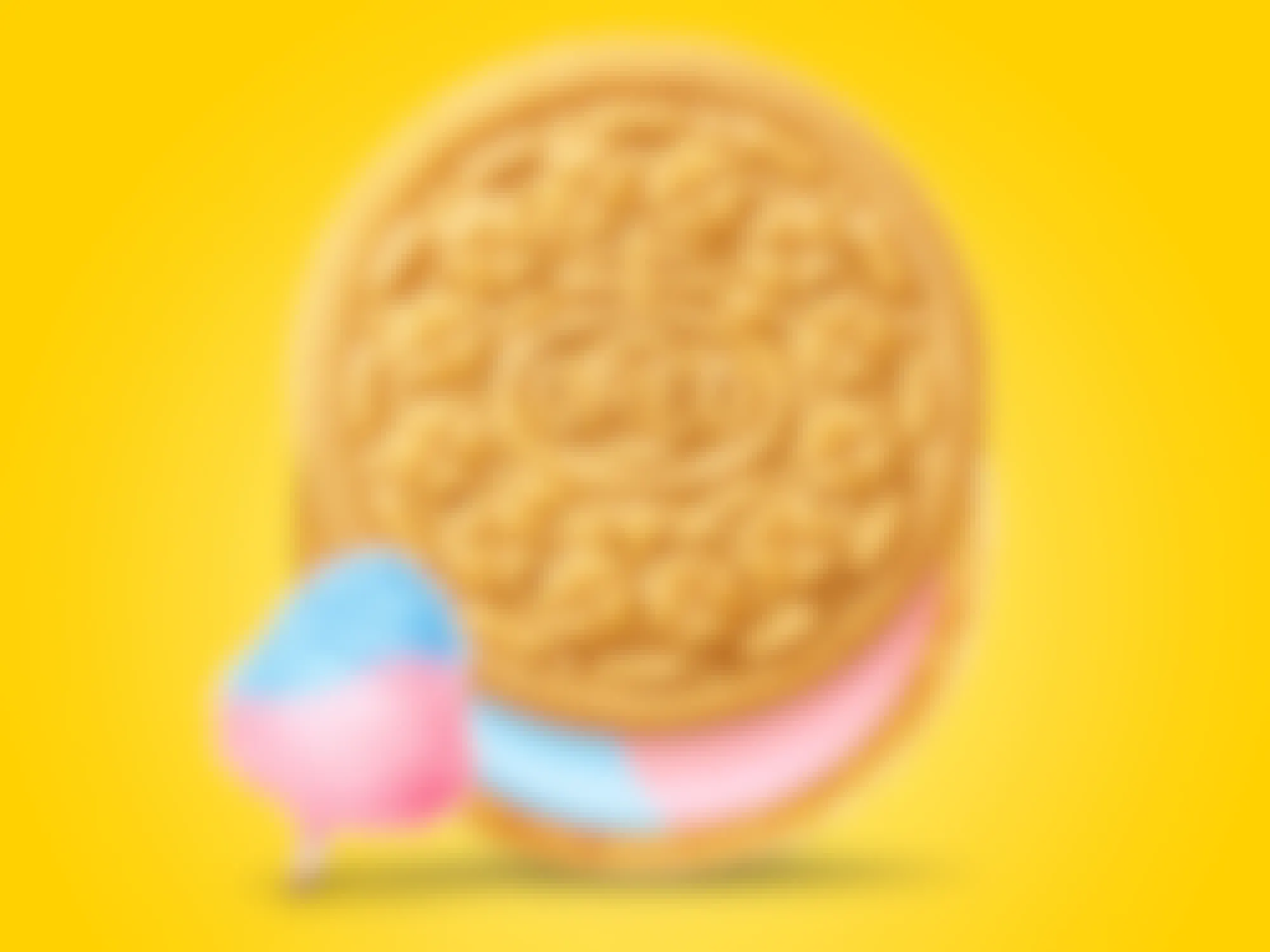 A cotton candy Oreo cookie with blue and pink creme on a bright yellow background
