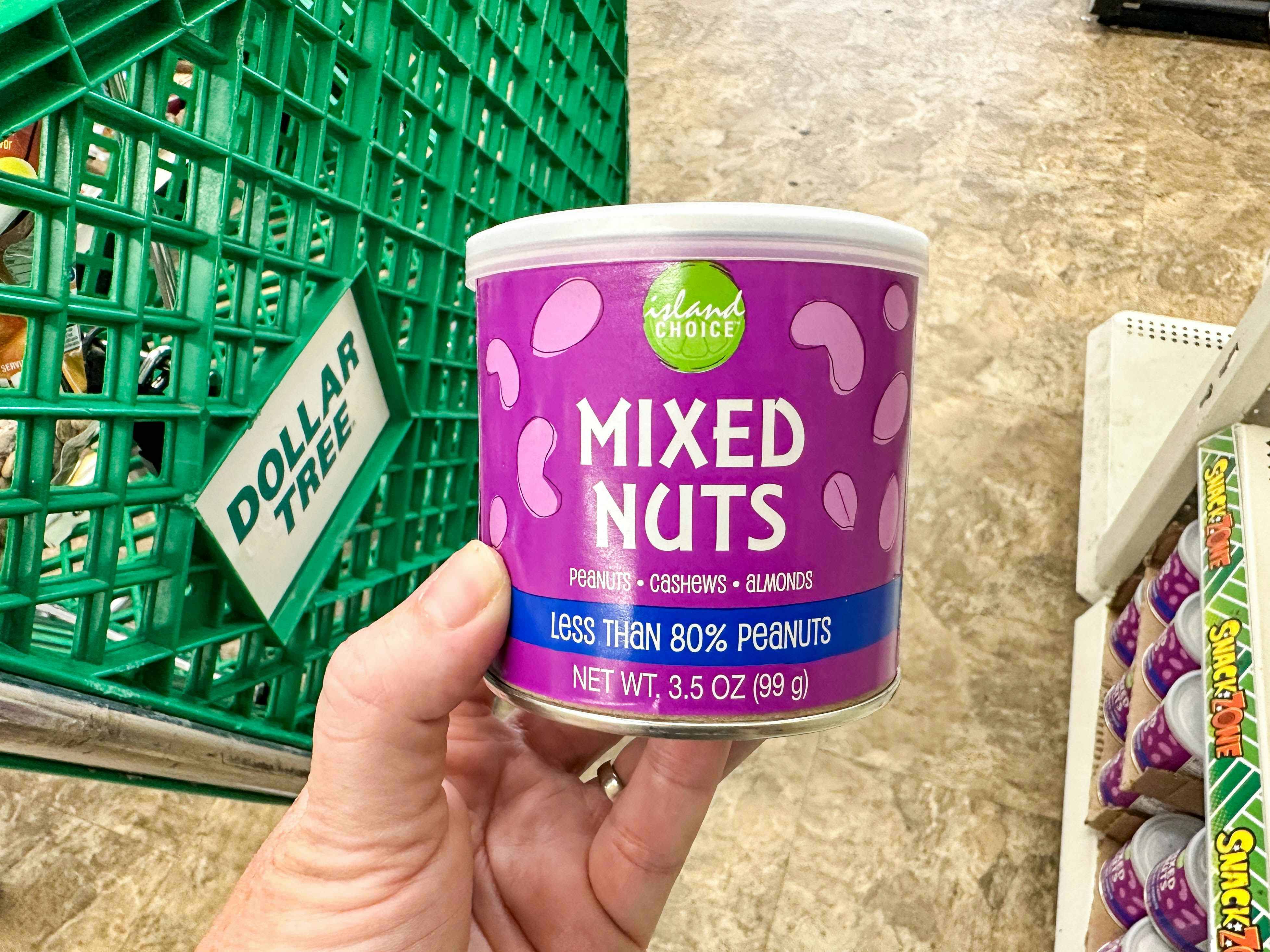 a container of mixed nuts next to a dollar tree cart 