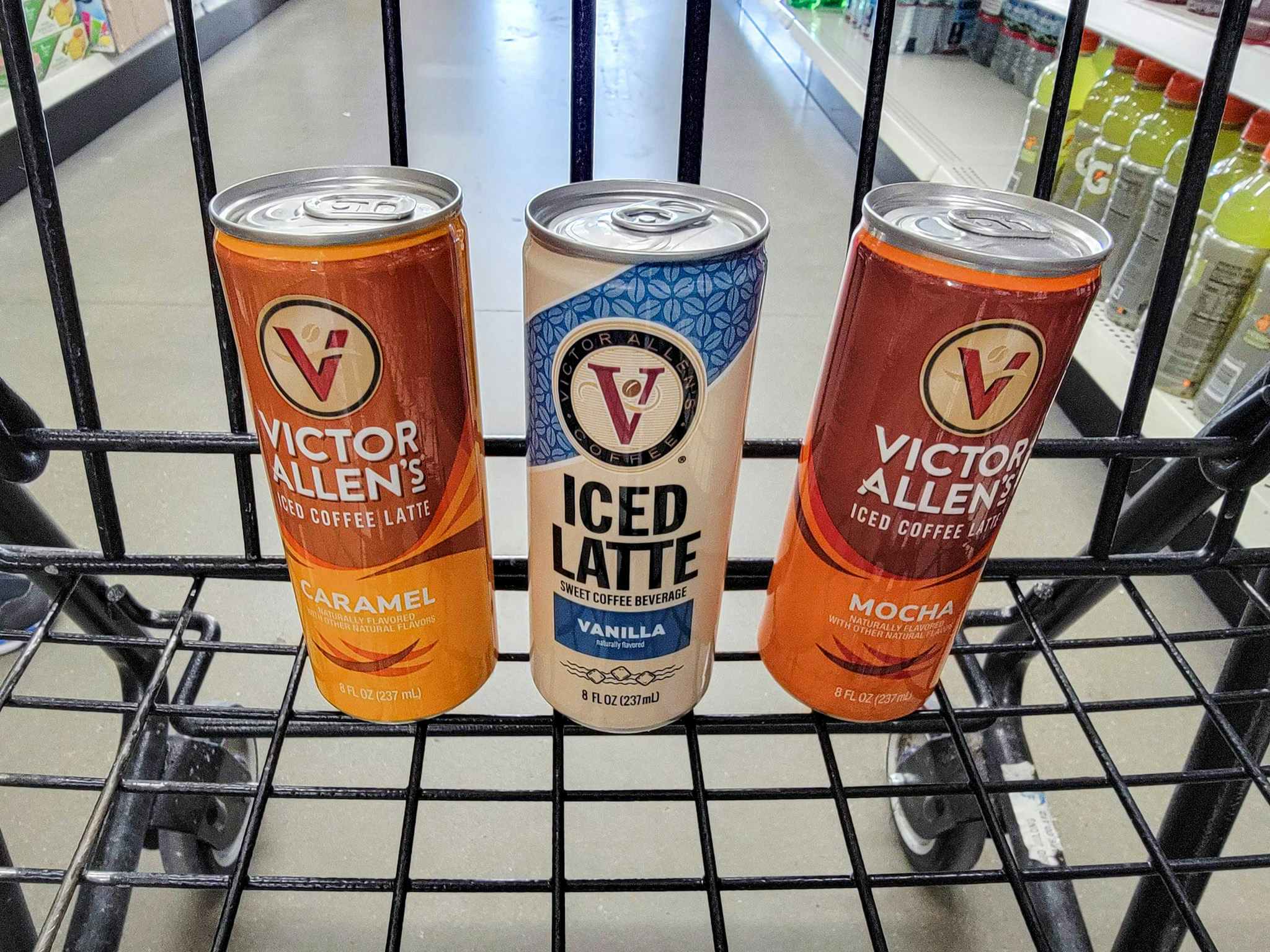 iced coffee lattes in a cart