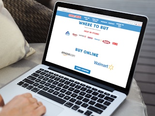 a person looking at the otter pop website on their macbook