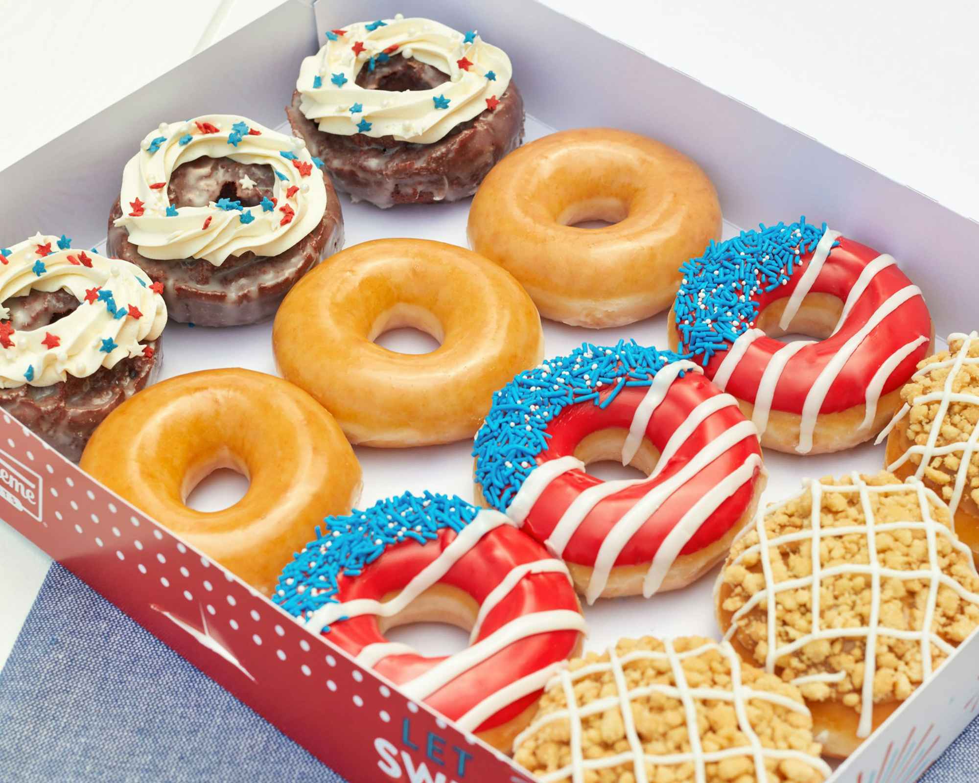 Red, White, and Blue themed doughnuts from Krispy Kreme in a box