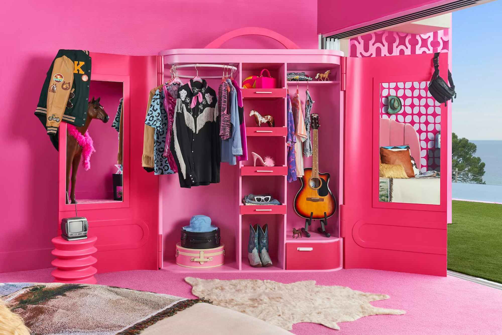 A closet in the Barbie's Malibu Dreamhouse Airbnb listing