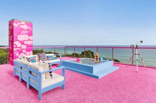 A patio balcony in the Barbie's Malibu Dreamhouse Airbnb listing