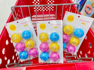 hurricane balls in a cart at target