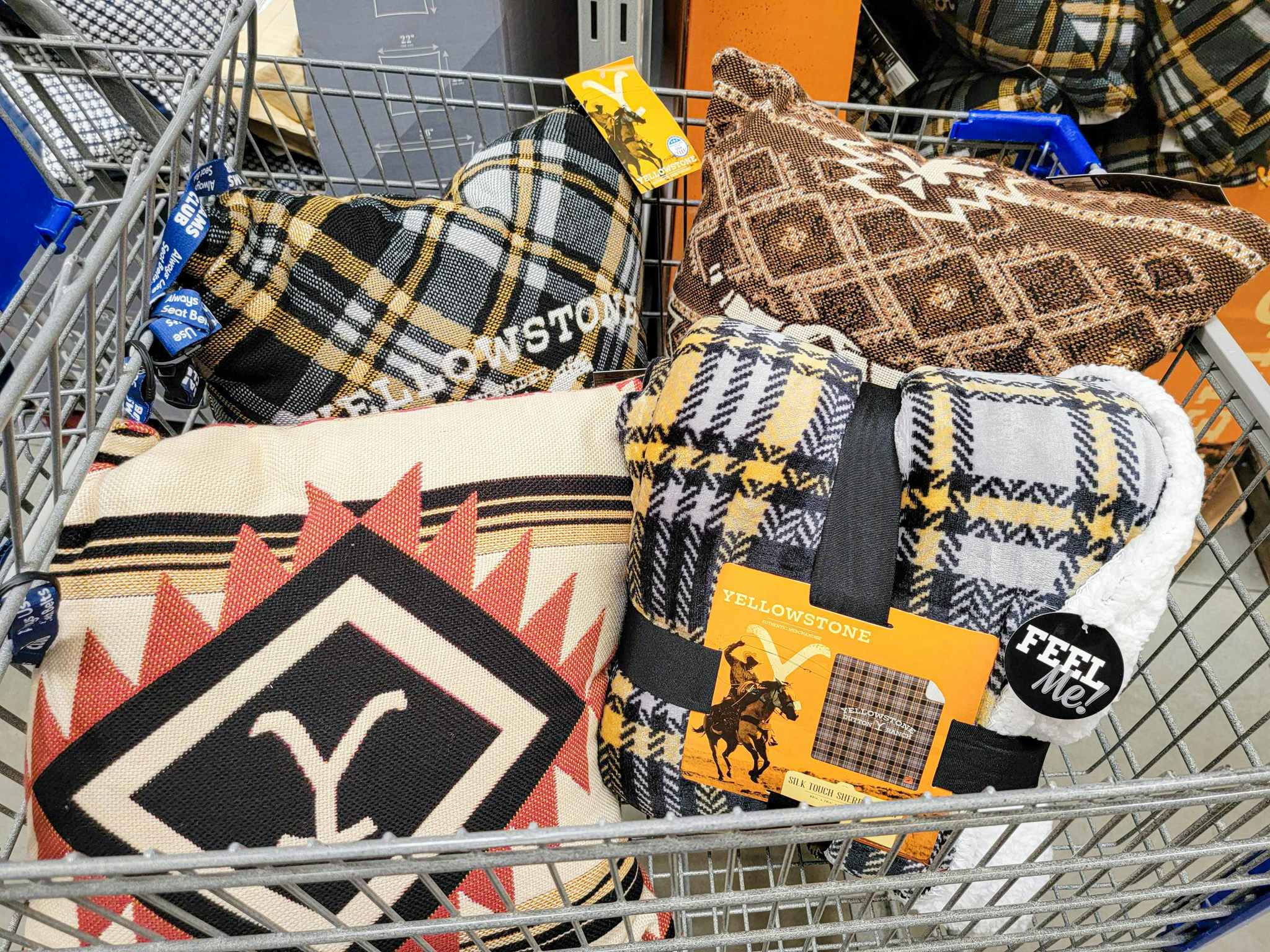yellowstone blanket & pillows in a cart