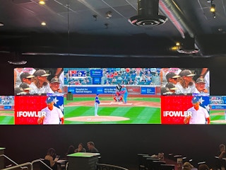 baseball game on big screens at dave and busters