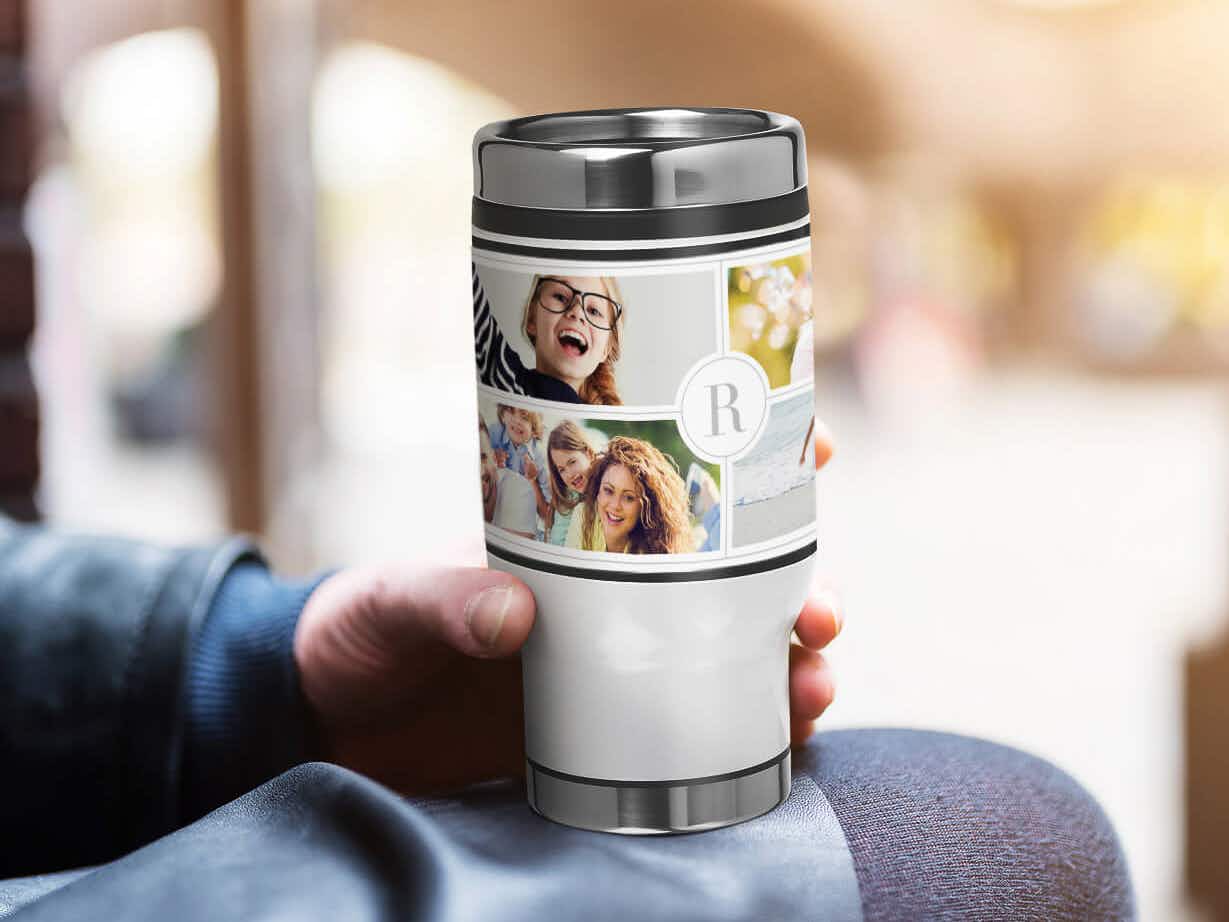 Someone holding a personalized photo gift tumbler from Staples