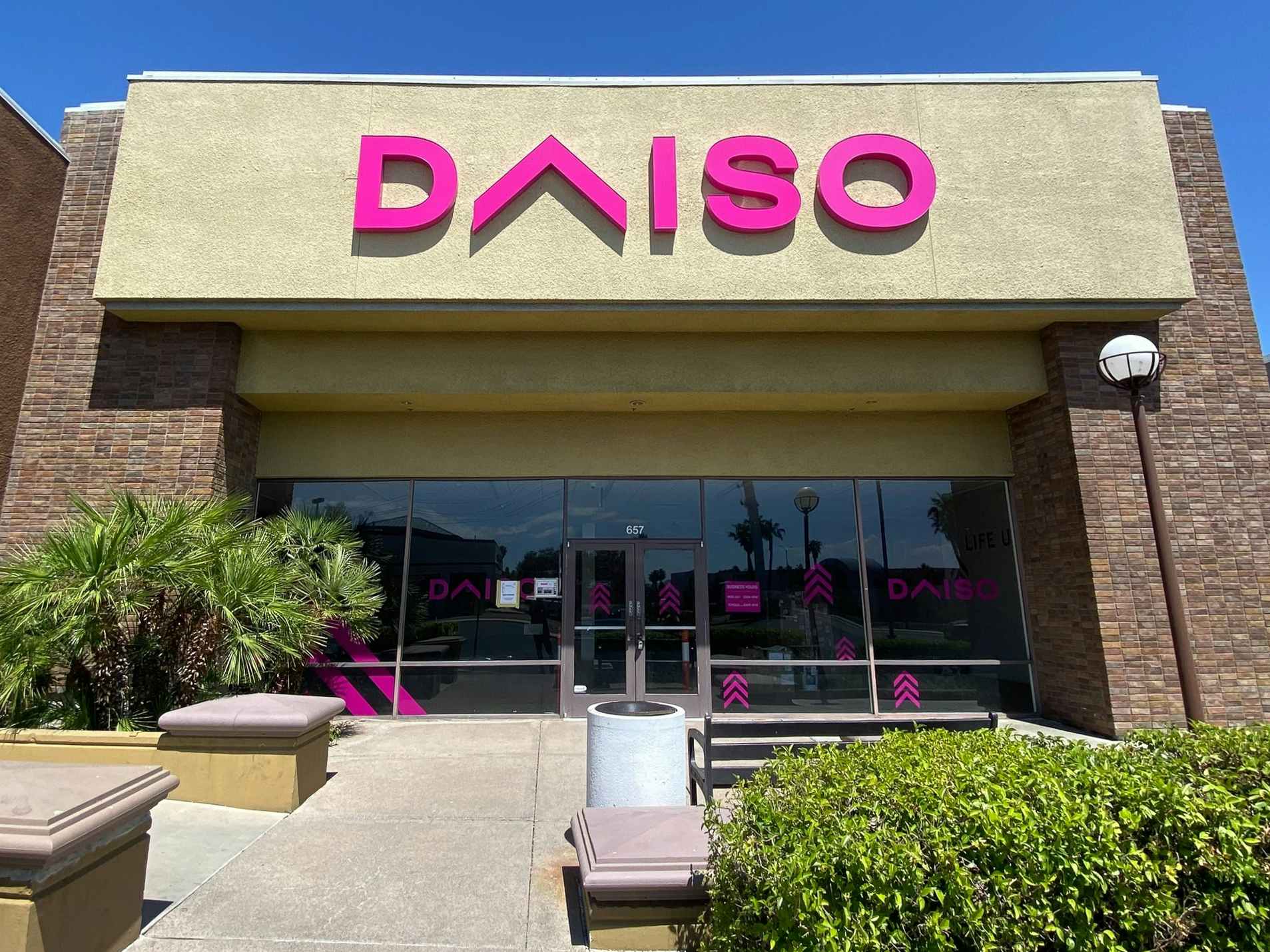 A Daiso store front in a shopping center