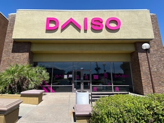 A Daiso store front in a shopping center