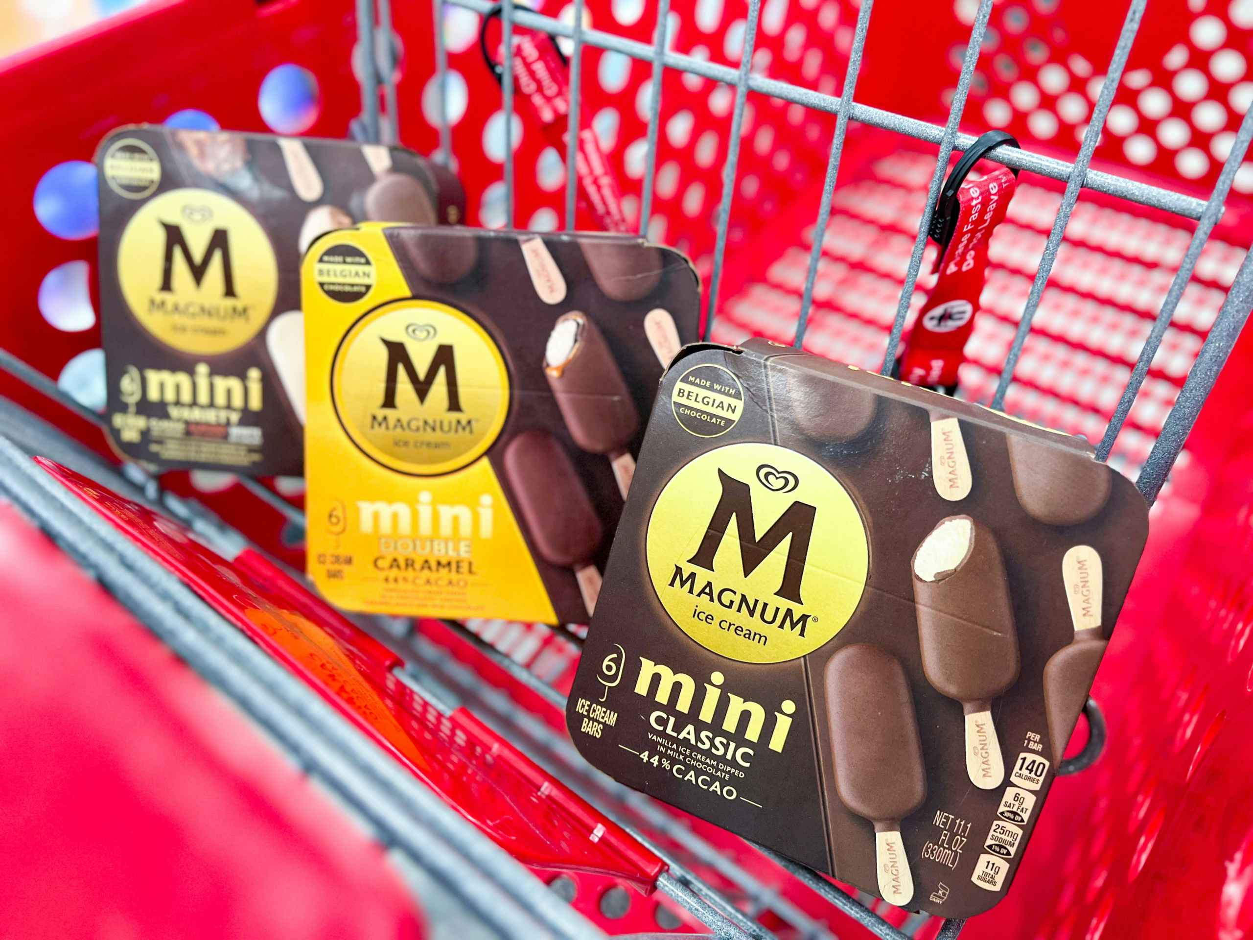 three Magnum Mini ice cream bar boxes in shopping cart