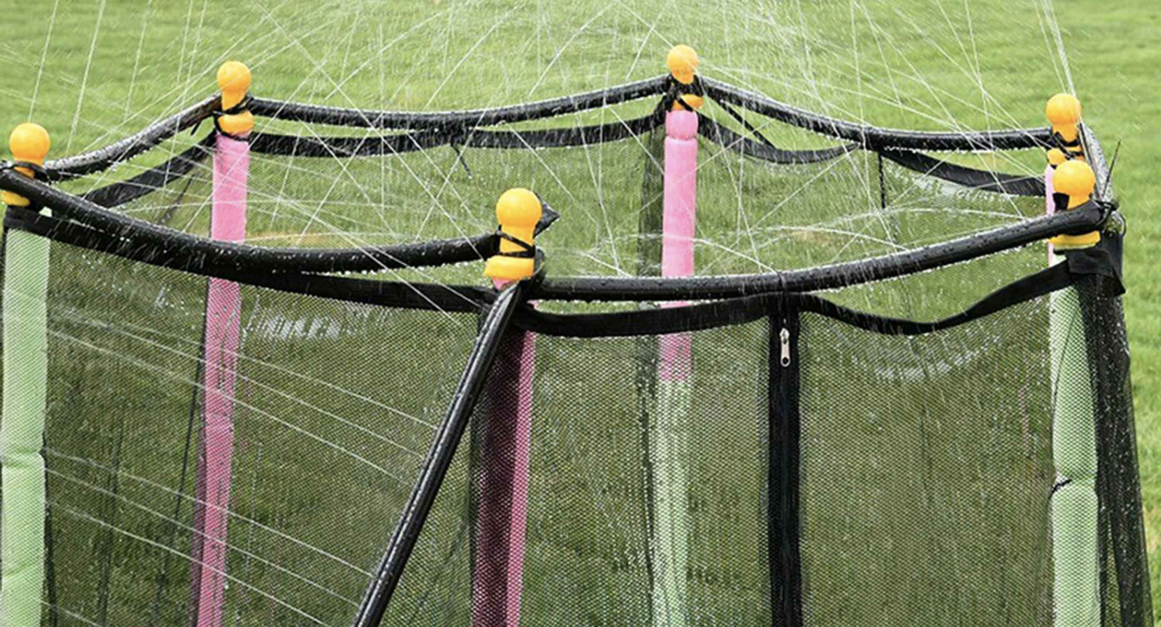 sprinkler attached to the top of a trampoline