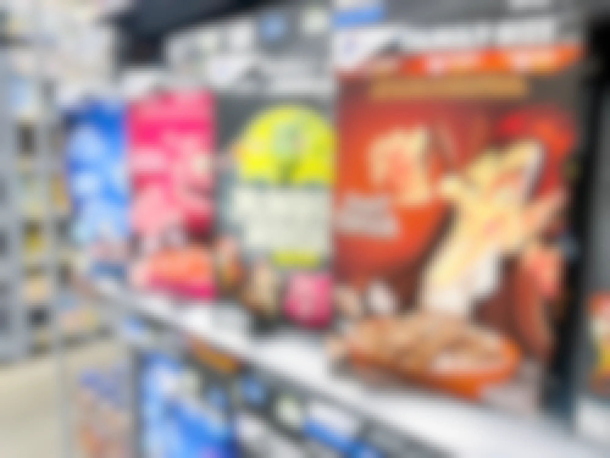 boxes of Boo Berry,Franken Berry, Monster Mash Remix, and Count Chocula monster cereal at Walmart
