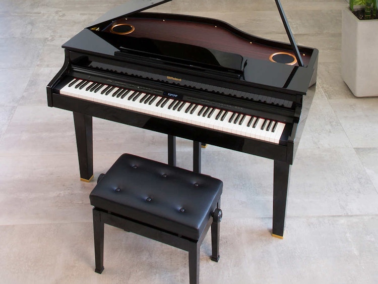 a mini grand piano 