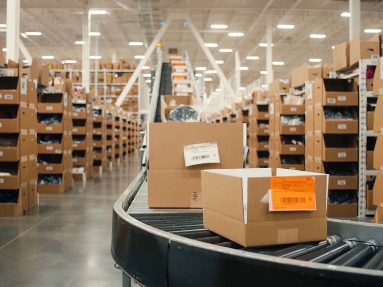 Some boxes being packed at the Aritzia distribution center