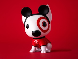 the bullseye funko pop in disney mickey ears and a disney 100 t-shirt