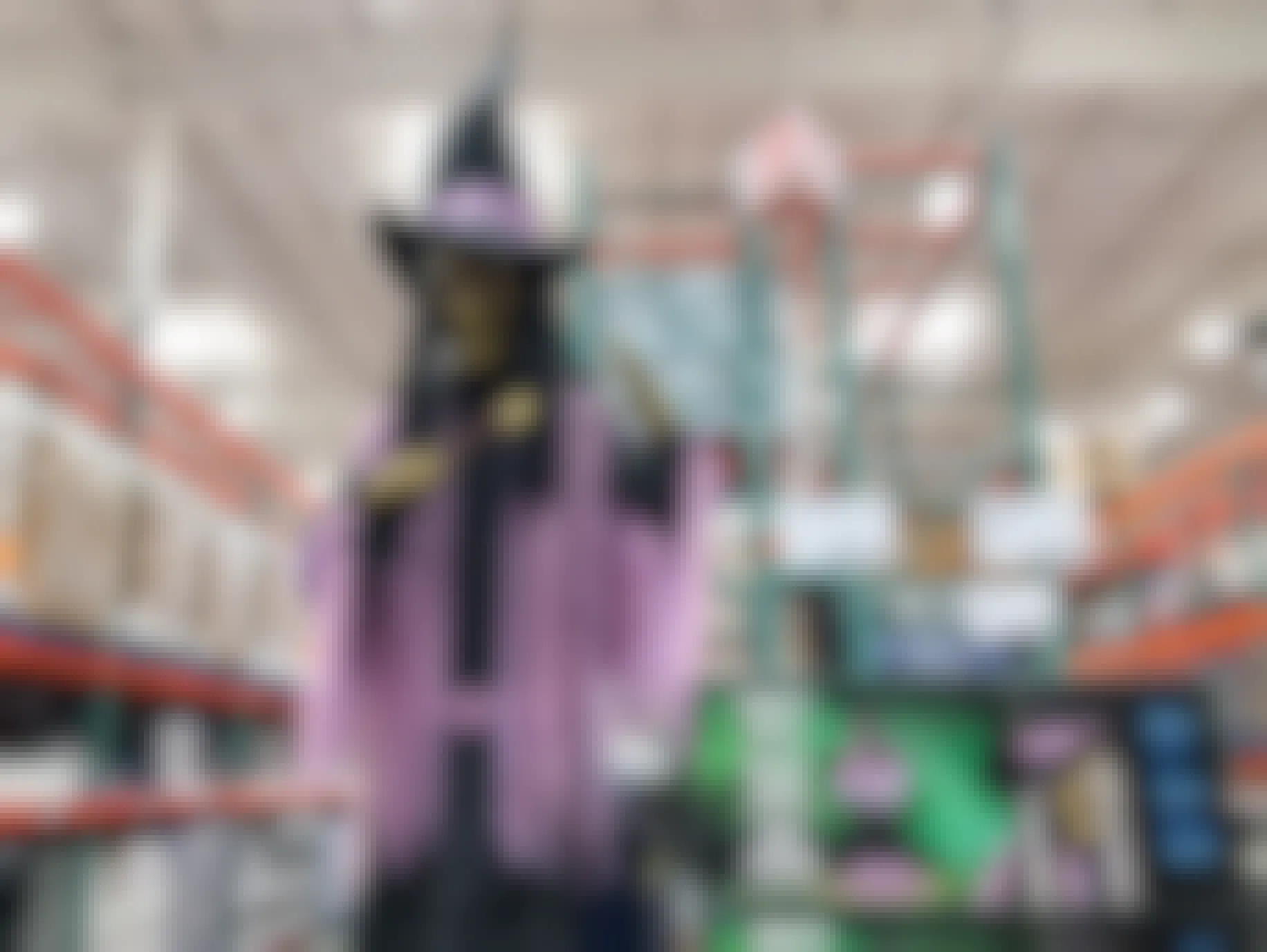 An animated witch Halloween decoration for sale at Costco