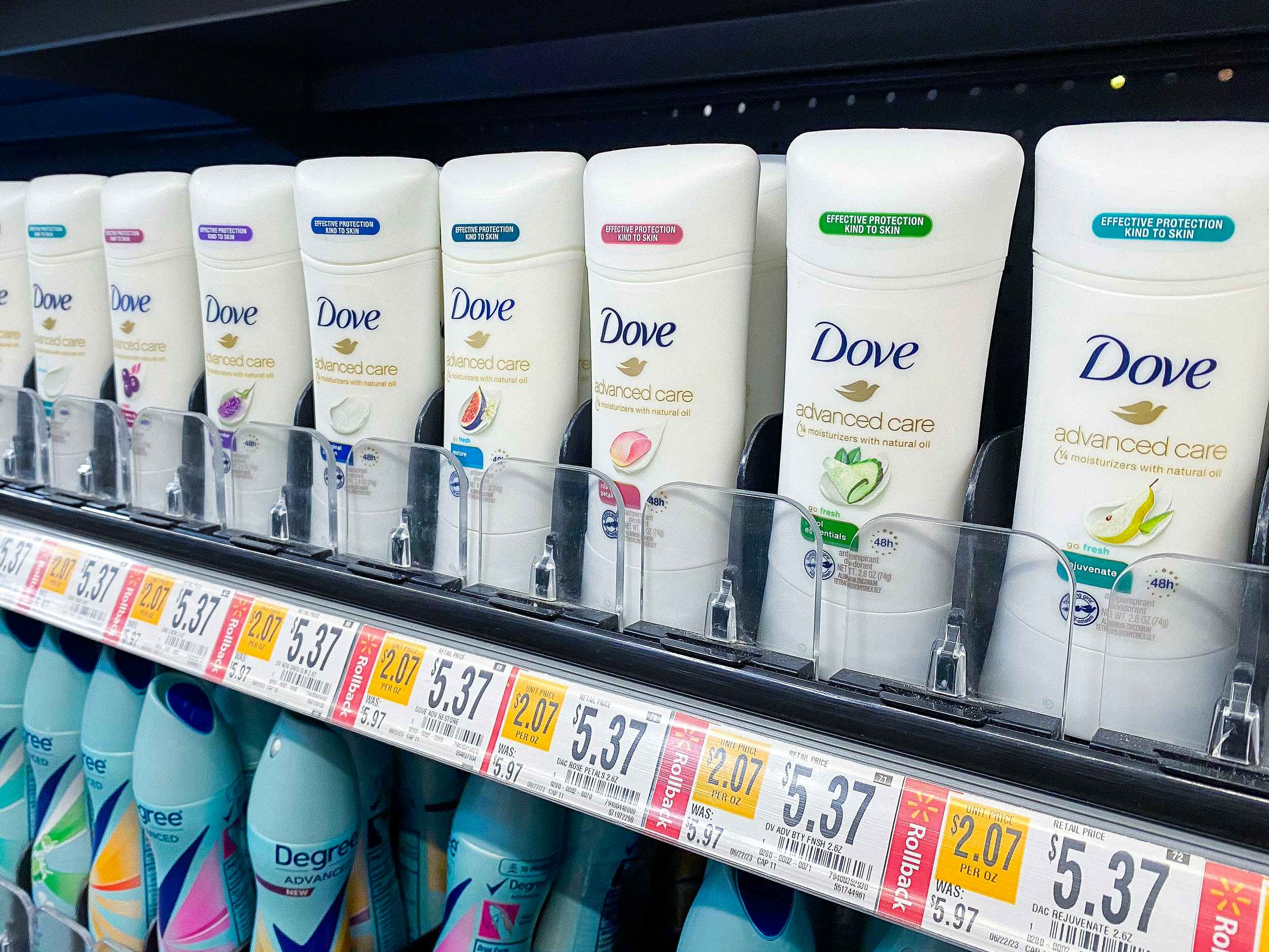 walmart shelf of dove advanced care deodorant sticks with prices