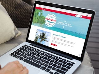 a person looking at the hallmark channel christmas cruise website on their macbook 