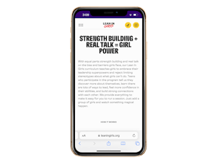 an iphone with the lean in girls website pulled up on it