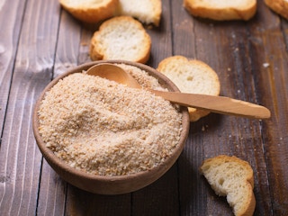 spoon and bowl of breadcrumbs made from stale bread