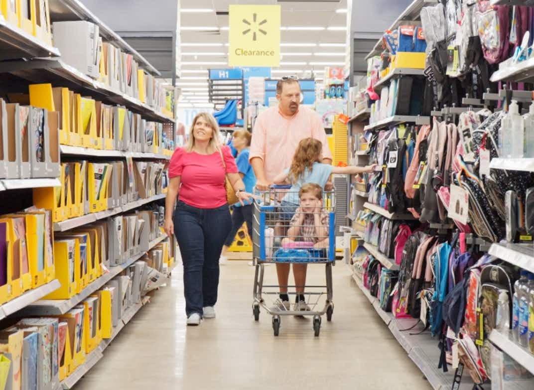 Family walking down store aisle