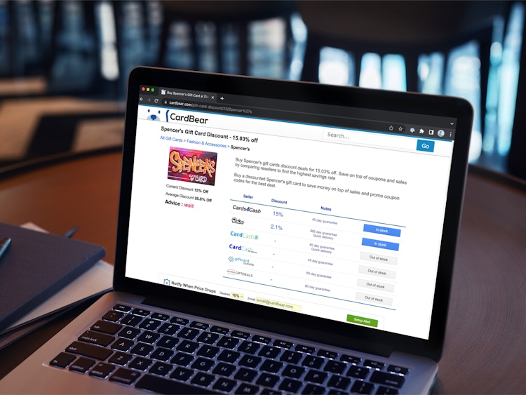 A laptop displaying discounted Spencer's gift cards on the CardBear website