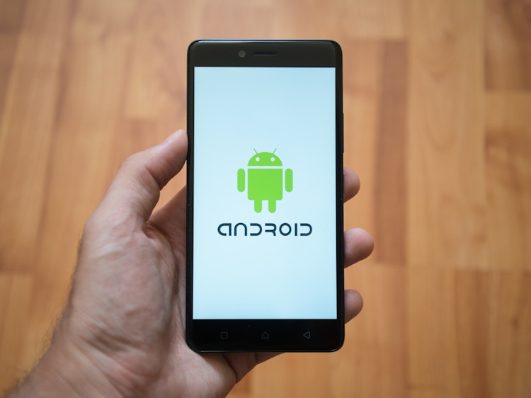 Someone holding up an Android phone
