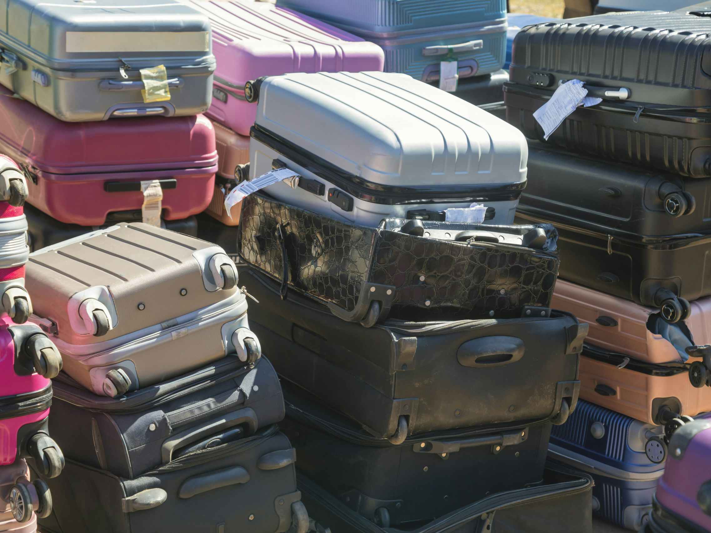 Stacks of unclaimed baggage from an airport