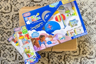 a little tikes story dream machine toy on an amazon box