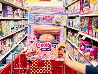 a person holding up a cookeez makery in target