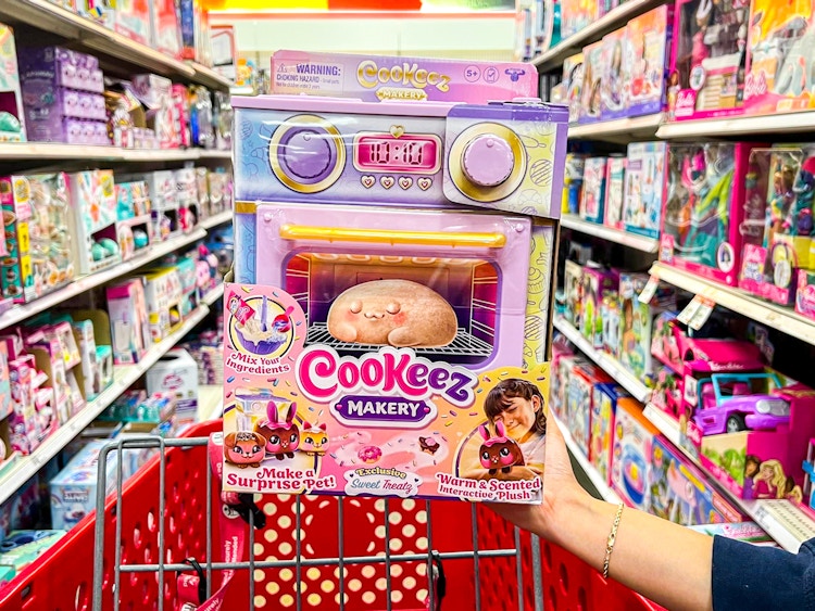 a person holding up a cookeez makery in target