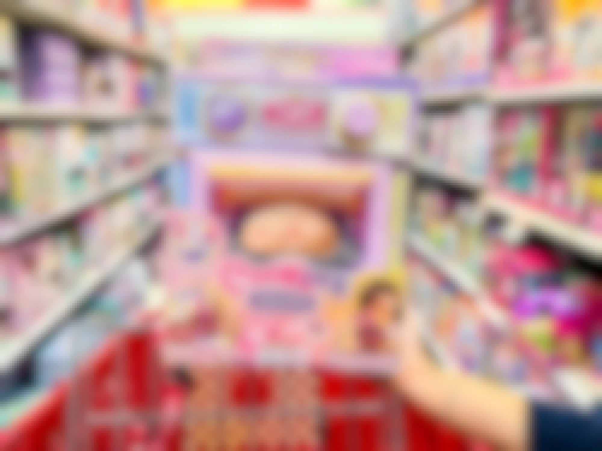 a person holding up a cookeez makery in target