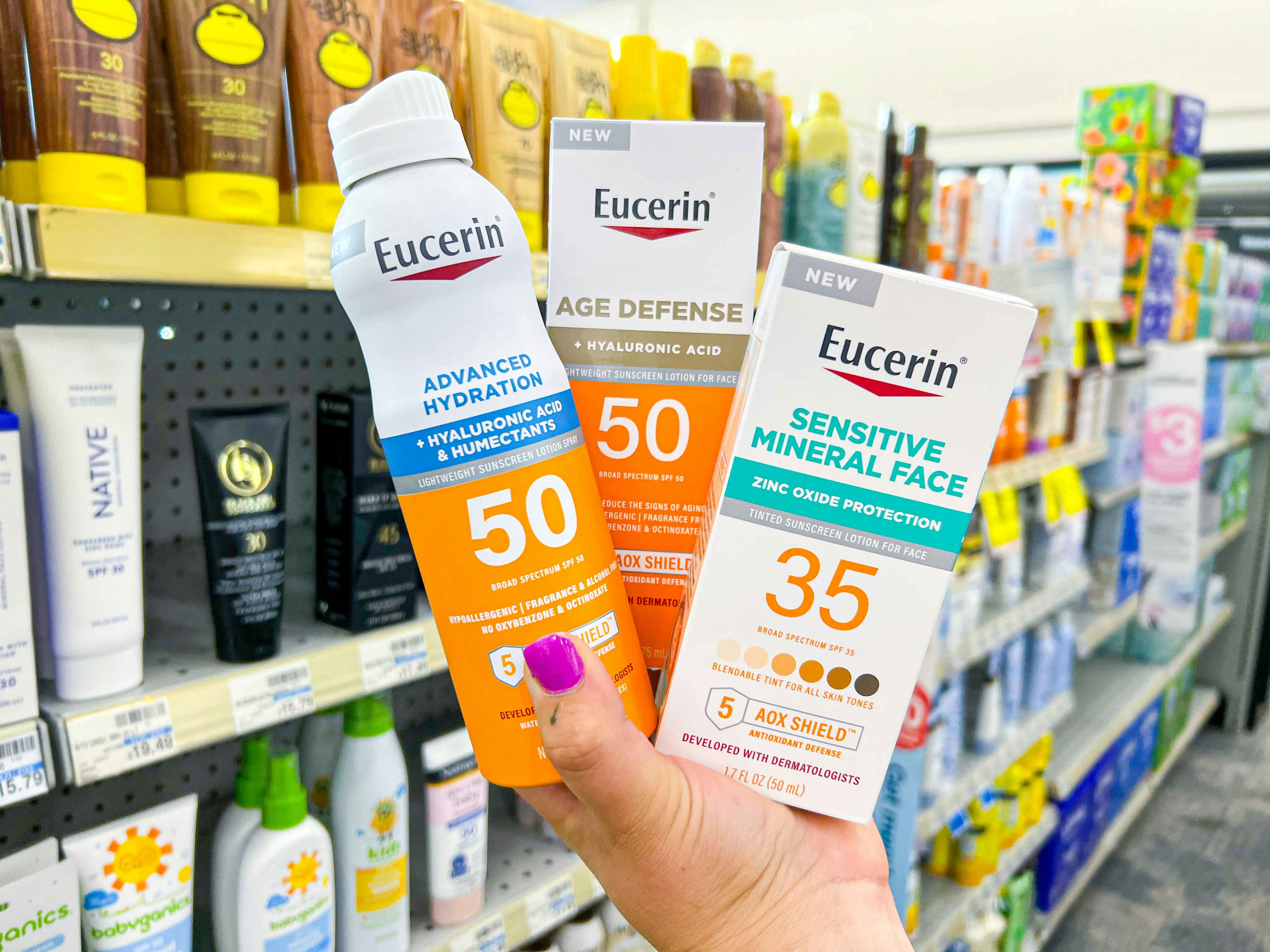 Eucerin in hand shot of 3 sunscreens