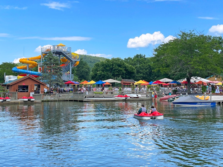 outdoor slides and a lake at rocking horse ranch resort