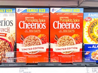 Two boxes of family size pumpkin spice cheerios on the shelf at Target