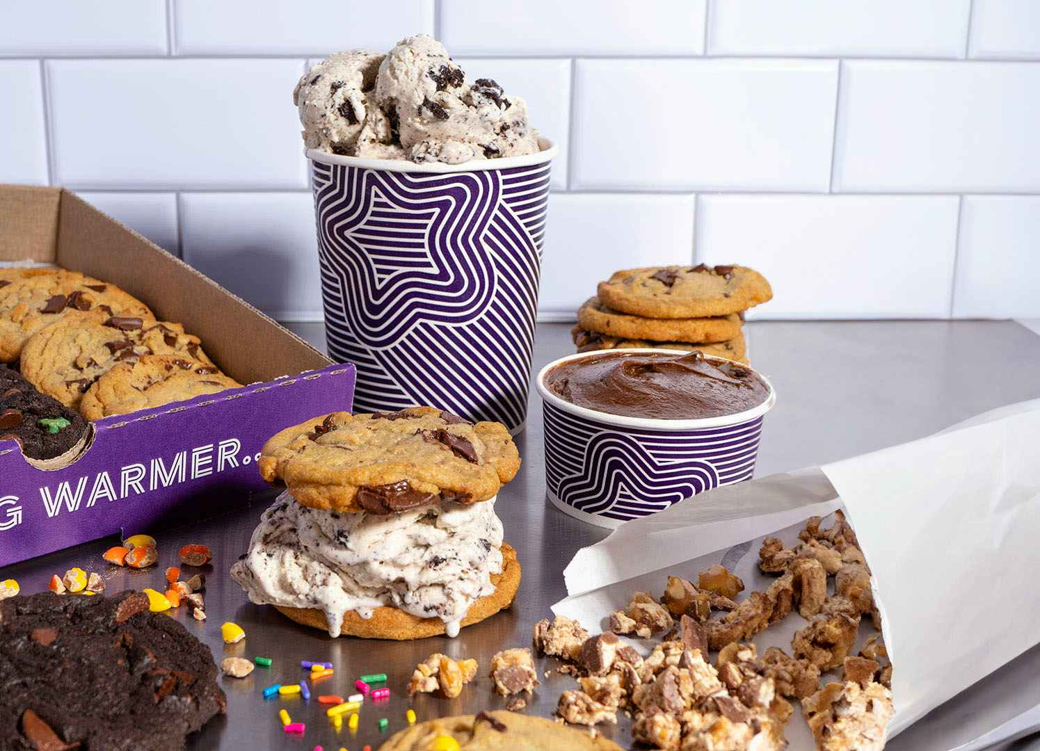 box of cookies cookie and ice cream sandwich and more from Insomnia Cookies
