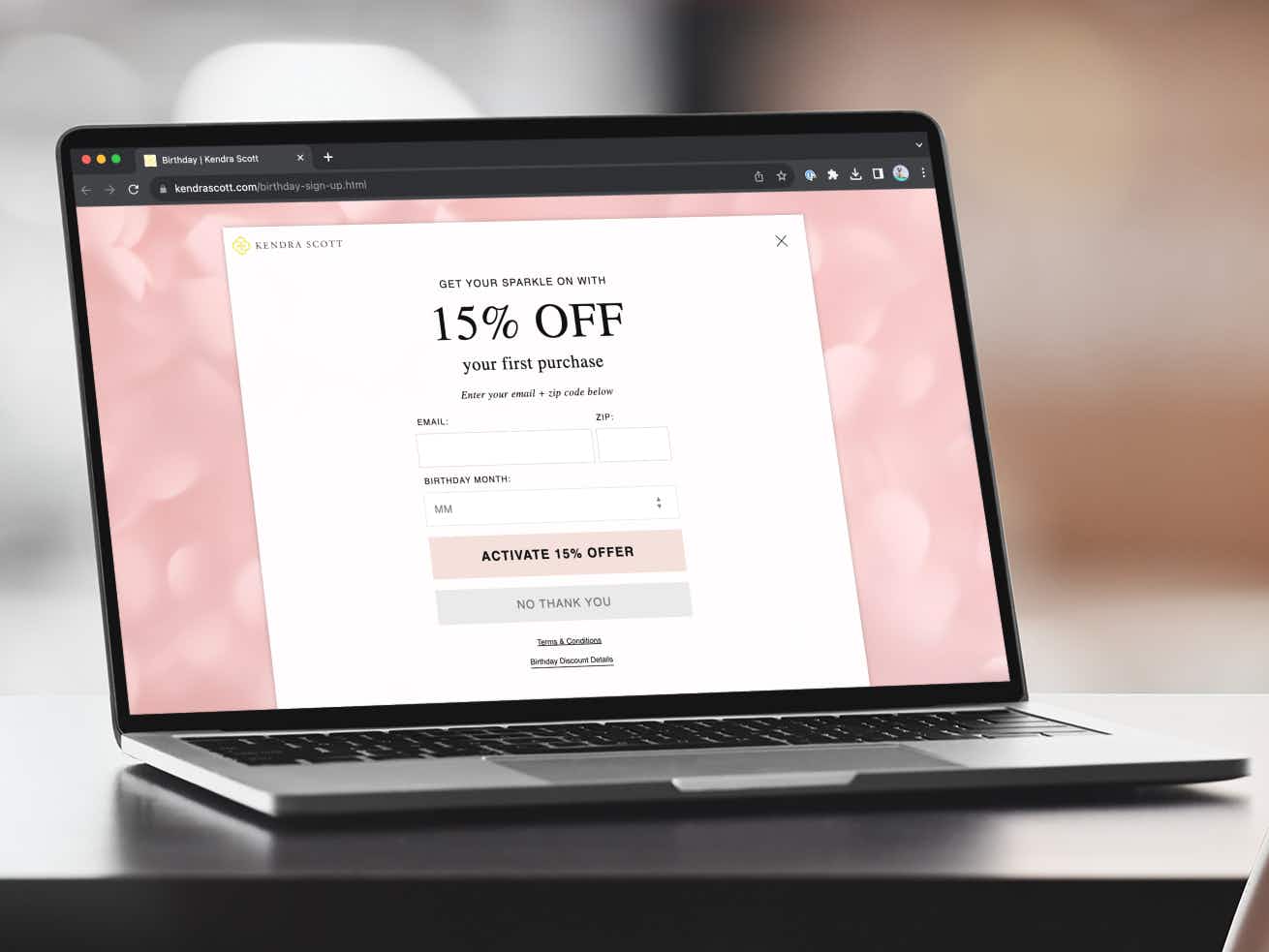 a laptop displaying the sign up page for the Kendra Scott birthday discount