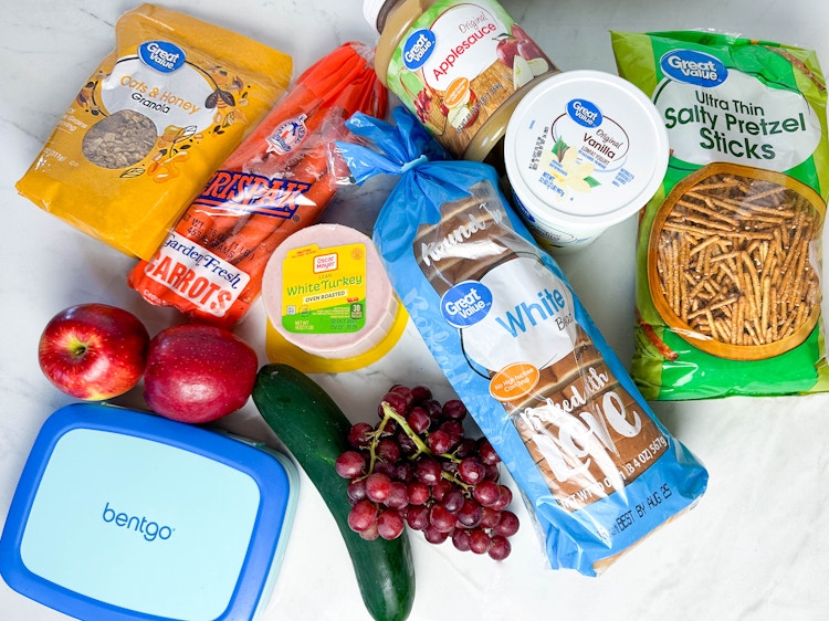 homemade kid bento box groceries on counter for school lunch