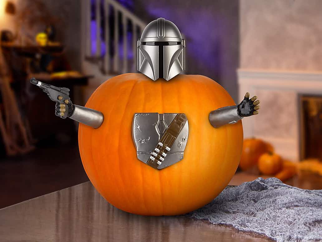a pumpkin decorated with a Star Wars kit
