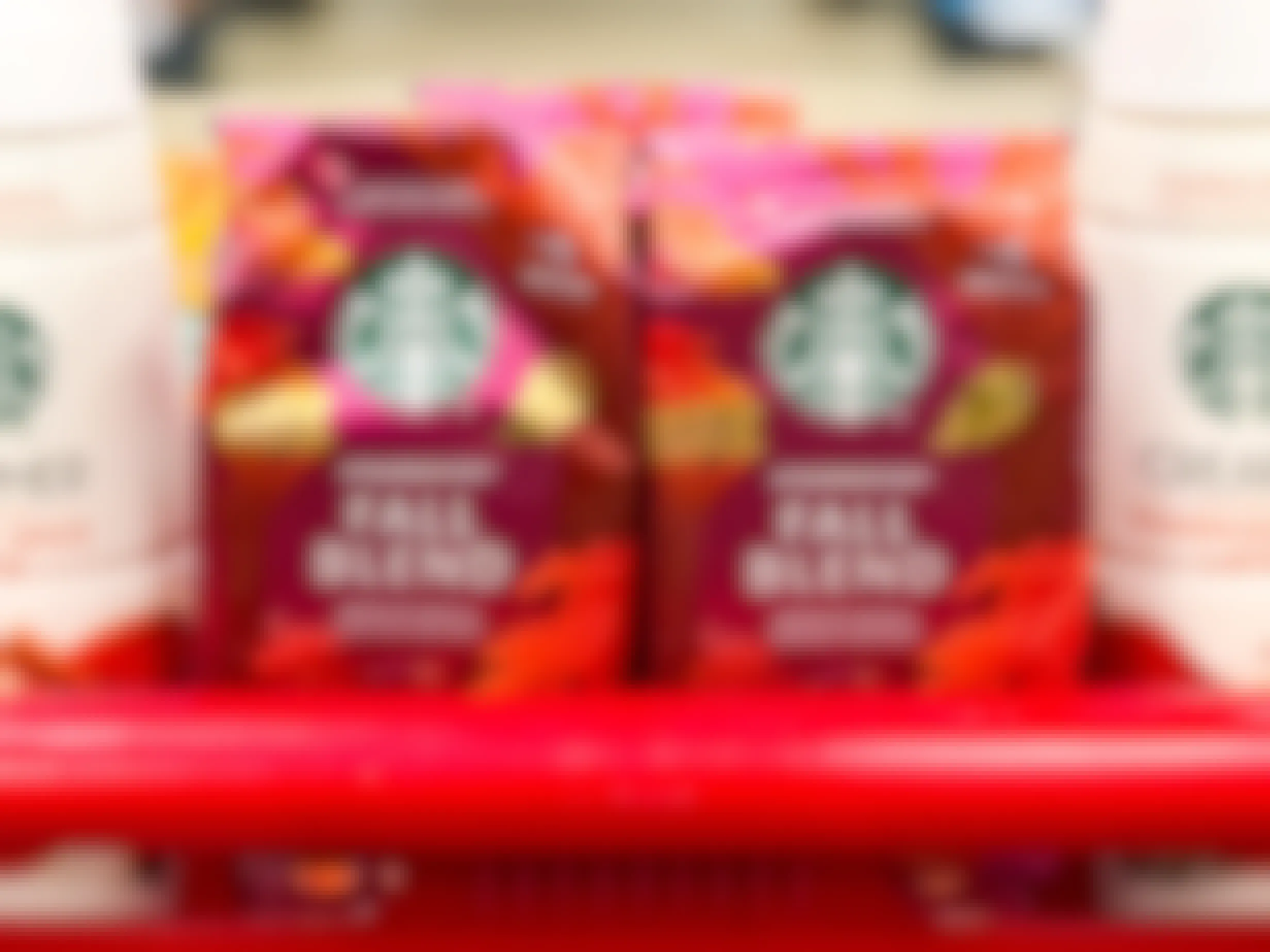 bags of Starbucks Fall Blend ground coffee in a Target cart